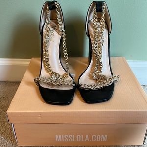 NWOT miss Lola black and wrap around gold chain heels